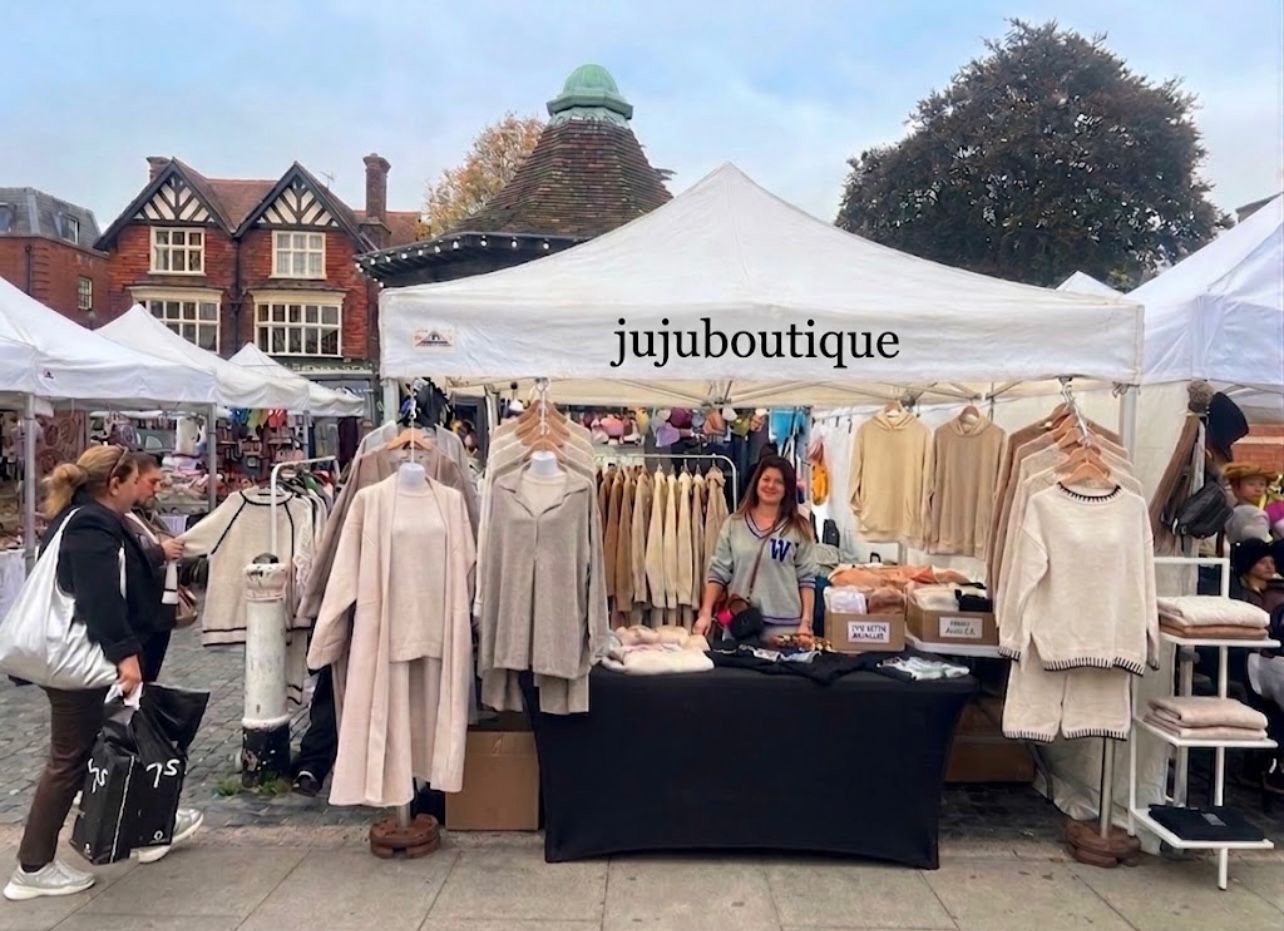 JUJU Boutique at a market stand